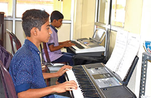 Purchase a piano for DB Center in Kerala, India