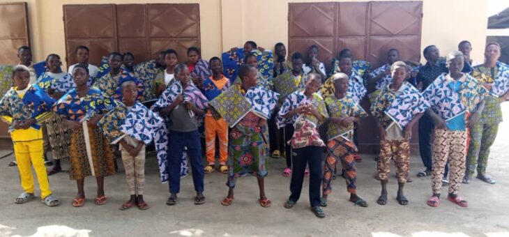 BENIN: Children in need receive clothing