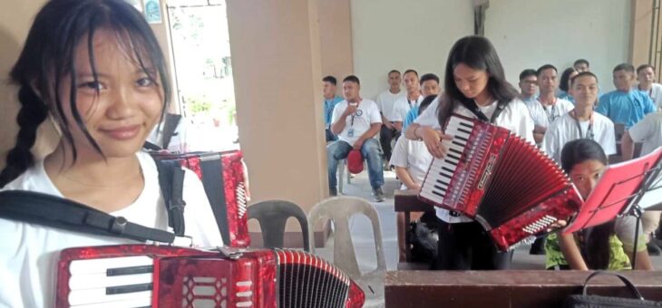 PHILIPPINES: Youth learning music through accordion donation