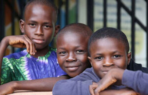 Feb 2025 enews - story #3 - Nigeria - A Surge of Abandoned Youth - three young boys grateful for a change at an education and better future